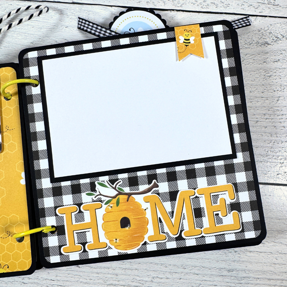 Happy Little Moments Scrapbook Album Page with a beehive, a bee tag, and a black and white gingham print