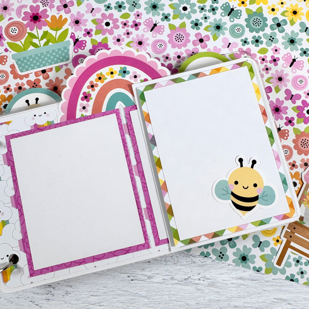 Happy Memories Scrapbook Mini Album Page with a flippie, cute clouds, rainbows, and a bumble bee