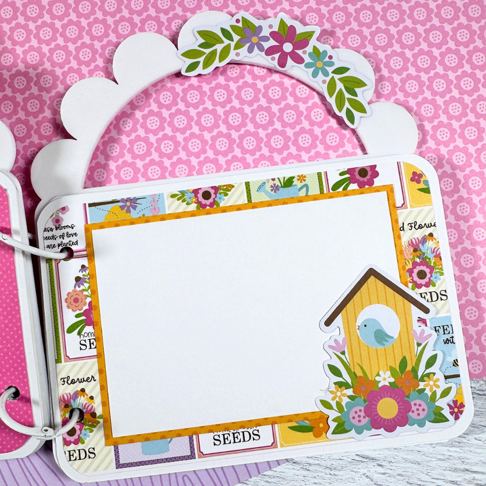 Spring Purse Shaped Acrylic Scrapbook Album Page with flowers, a birdhouse, and seed packets