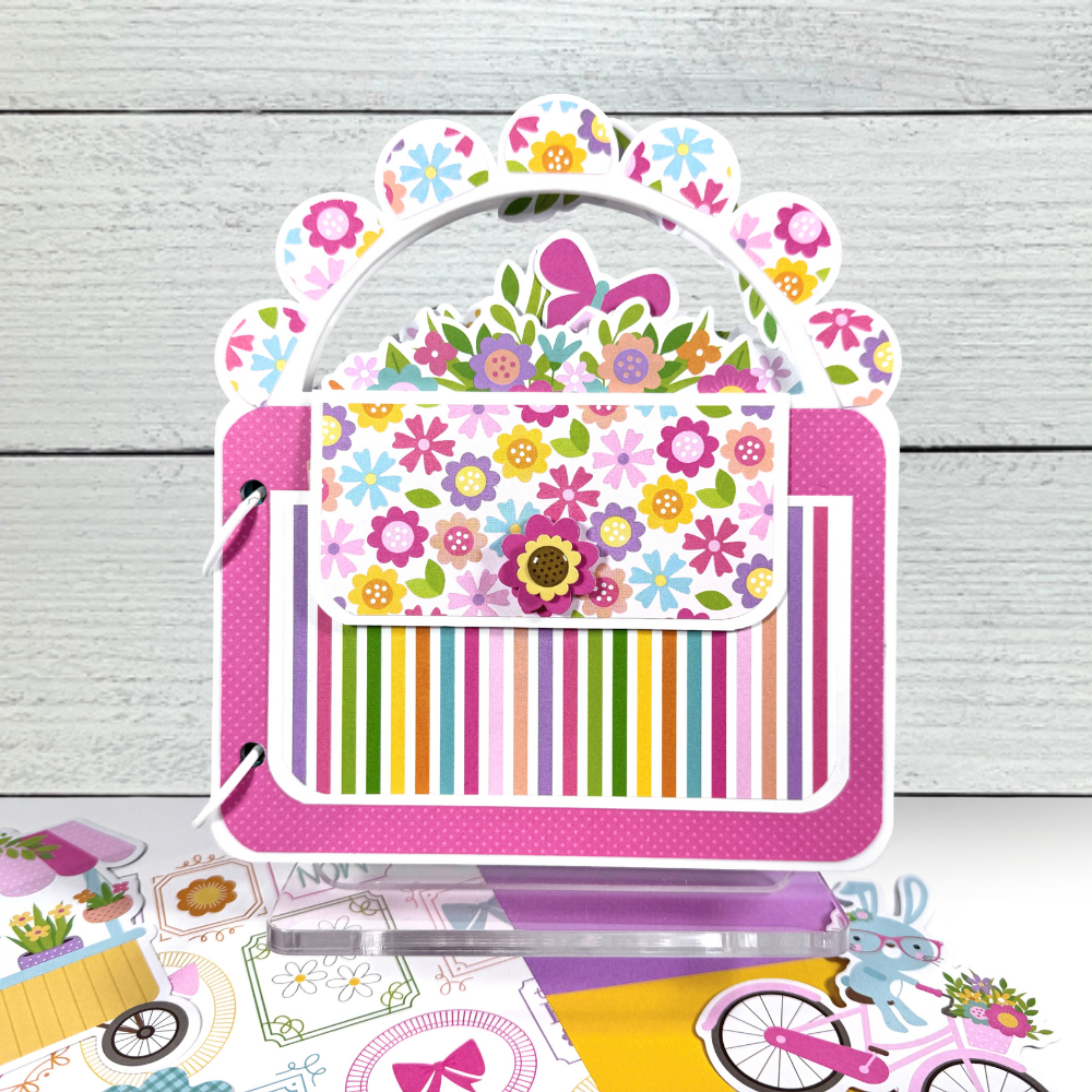 Spring Purse Shaped Acrylic Scrapbook Album on a clear acrylic display stand