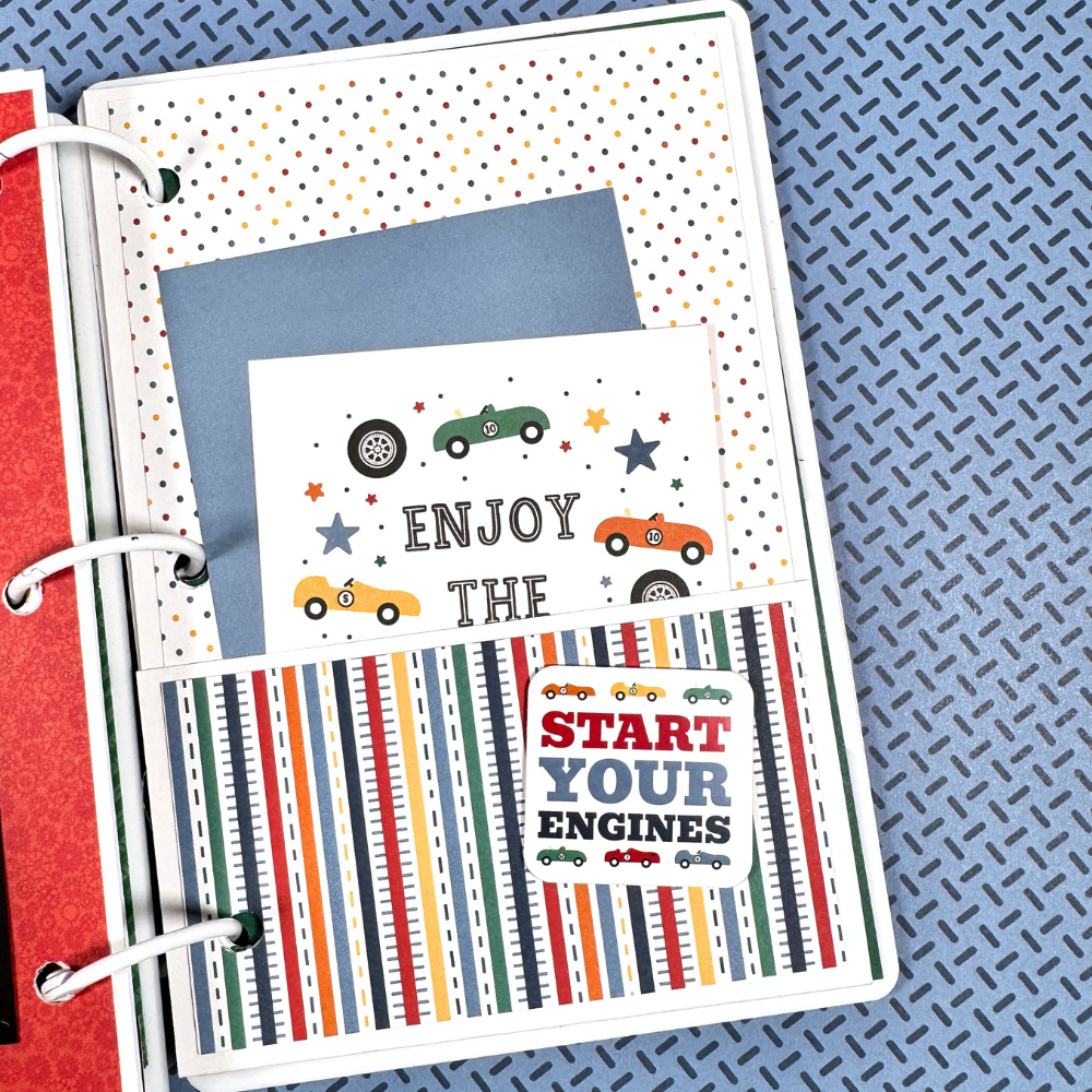 Coolest Kid Ever Scrapbook Album Page with a pocket, journaling cards, race cars, polka dots, and stripes
