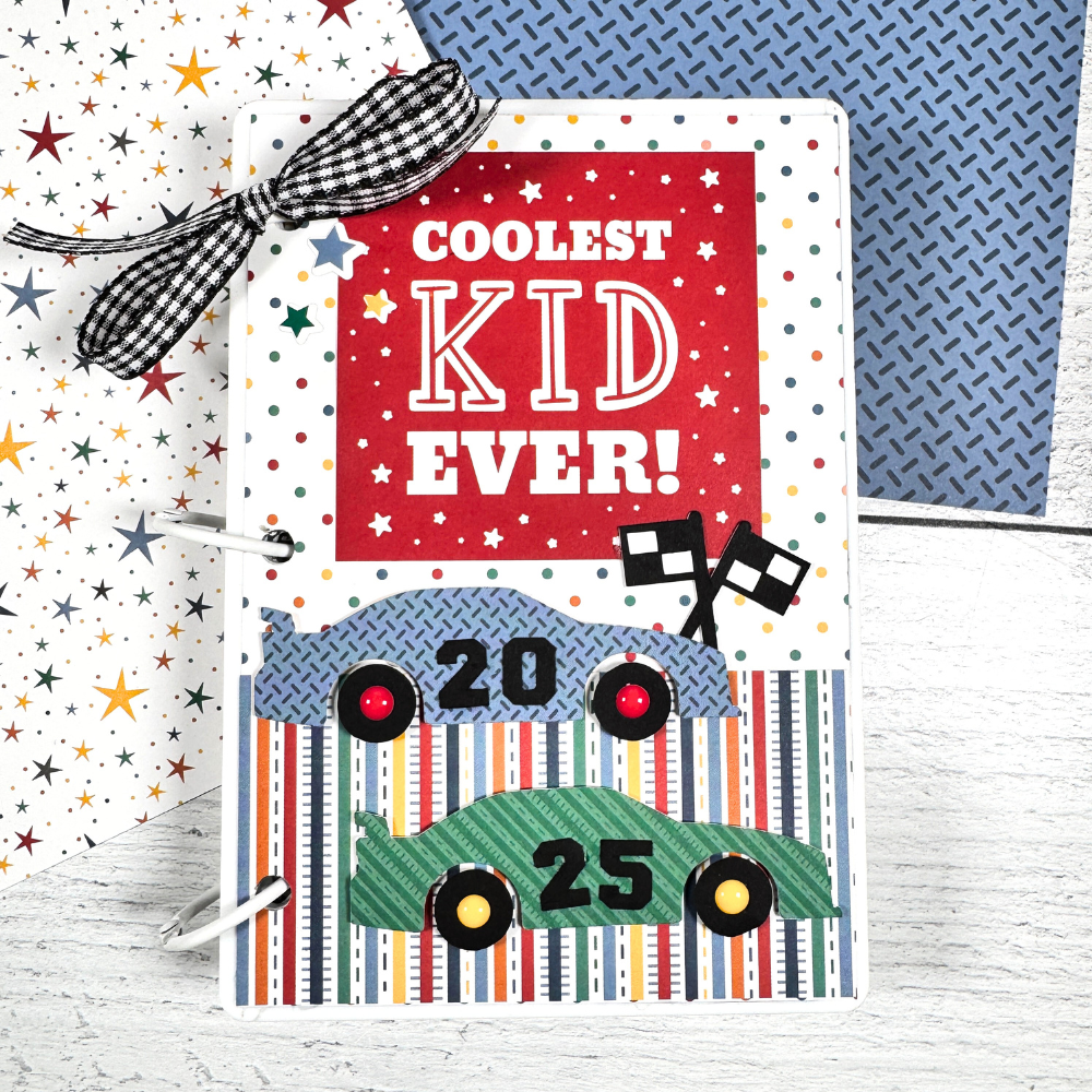 Coolest Kid Ever Scrapbook Mini Album with race cars, flags, a road, polka dots, and stripes