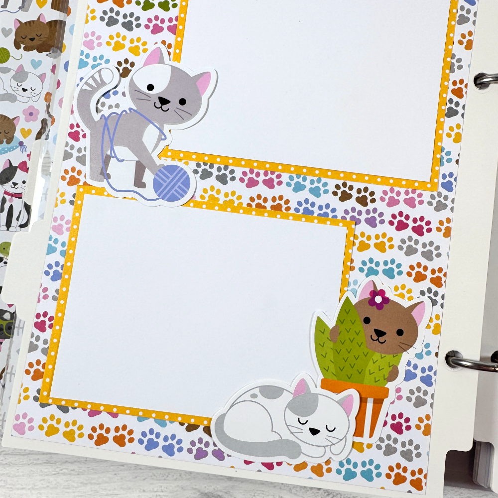 Cat Meow Scrapbook Mini Album Page with kitties, paw prints, plants, and balls of yarn