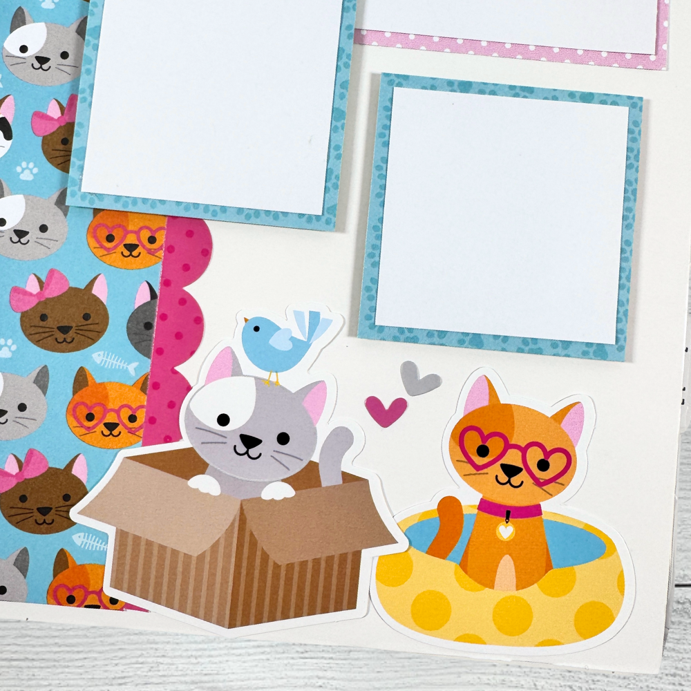Cat Meow Scrapbook Mini Album Page with cute cat faces, a cat sitting in a box, and one in a bed