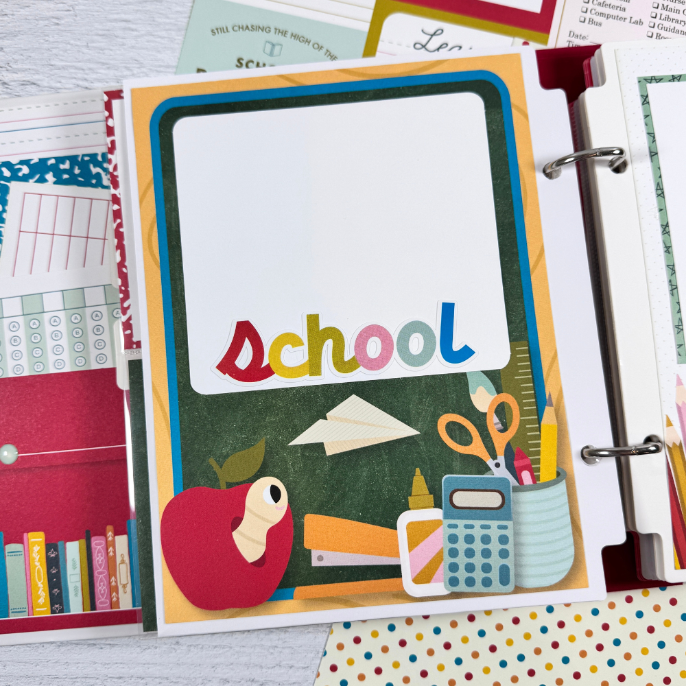 School Vibes Scrapbook Mini Album Page with an apple, a chalkboard, an apple with a cute worm, and lots of school supplies