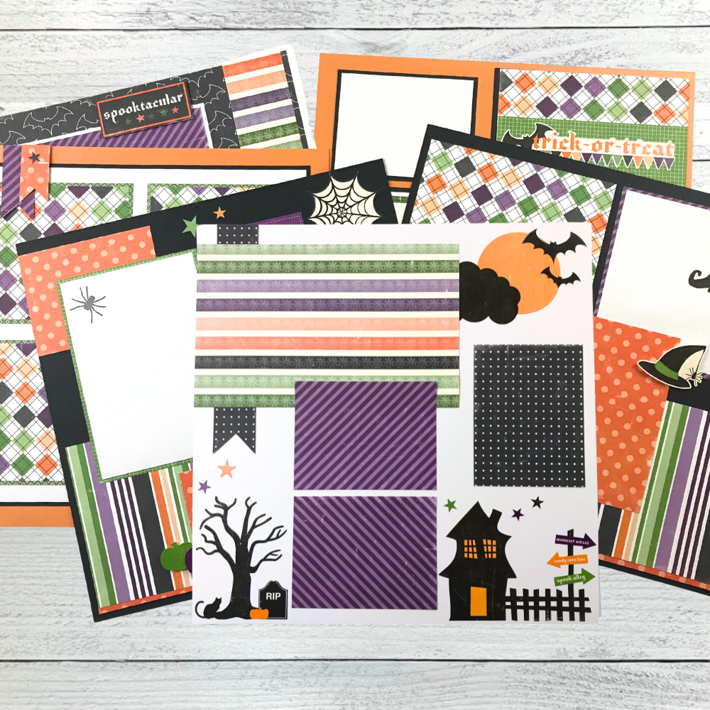 12x12 Spooktacular Halloween Scrapbook Layouts with bats, spiders, witch's hat and boots, trees, webs, cat, pumpkin, and the moon