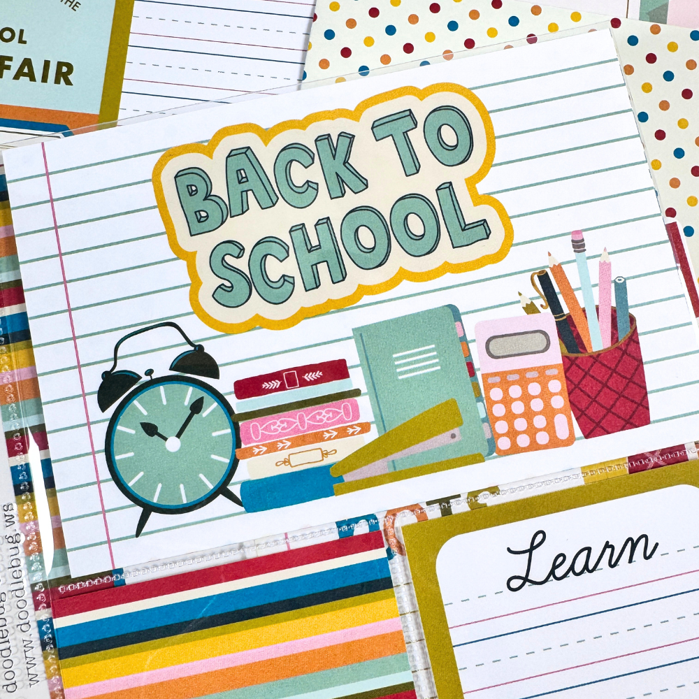 School Vibes Scrapbook Mini Album Page with a clock, colorful stripes, and lots of school supplies