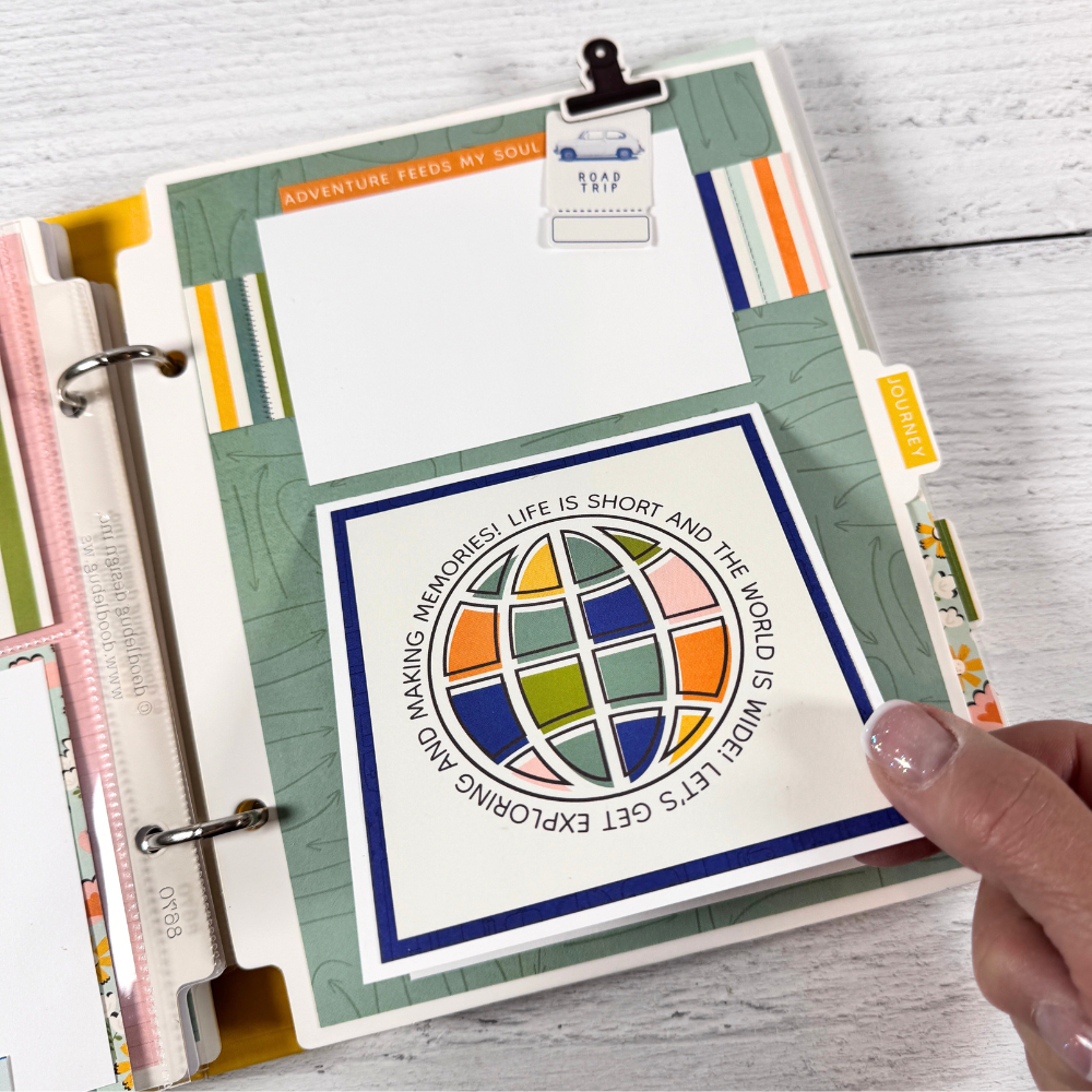 Travel Vibes Scrapbook Mini Album page with a folding card and a globe