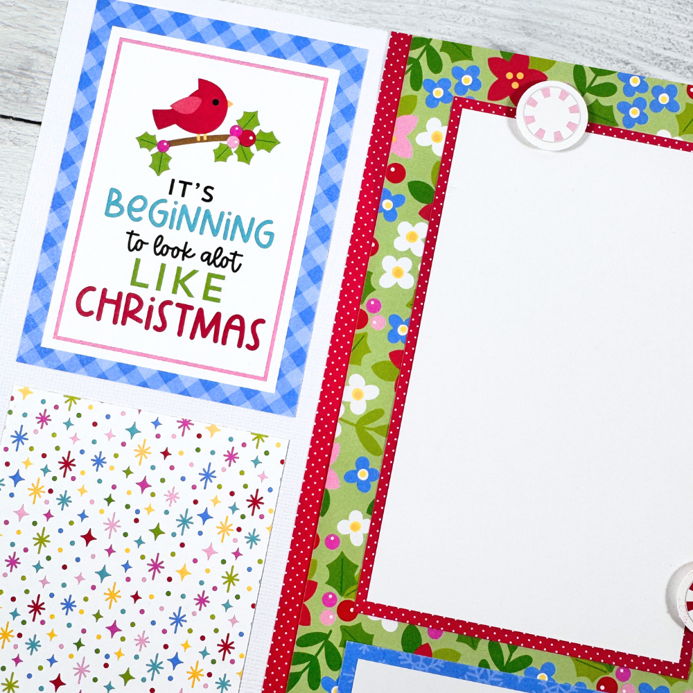 12x12 Oh What Fun Christmas Scrapbook Layout with a red cardinal bird, flowers, holly leaves, berries, and polka dots