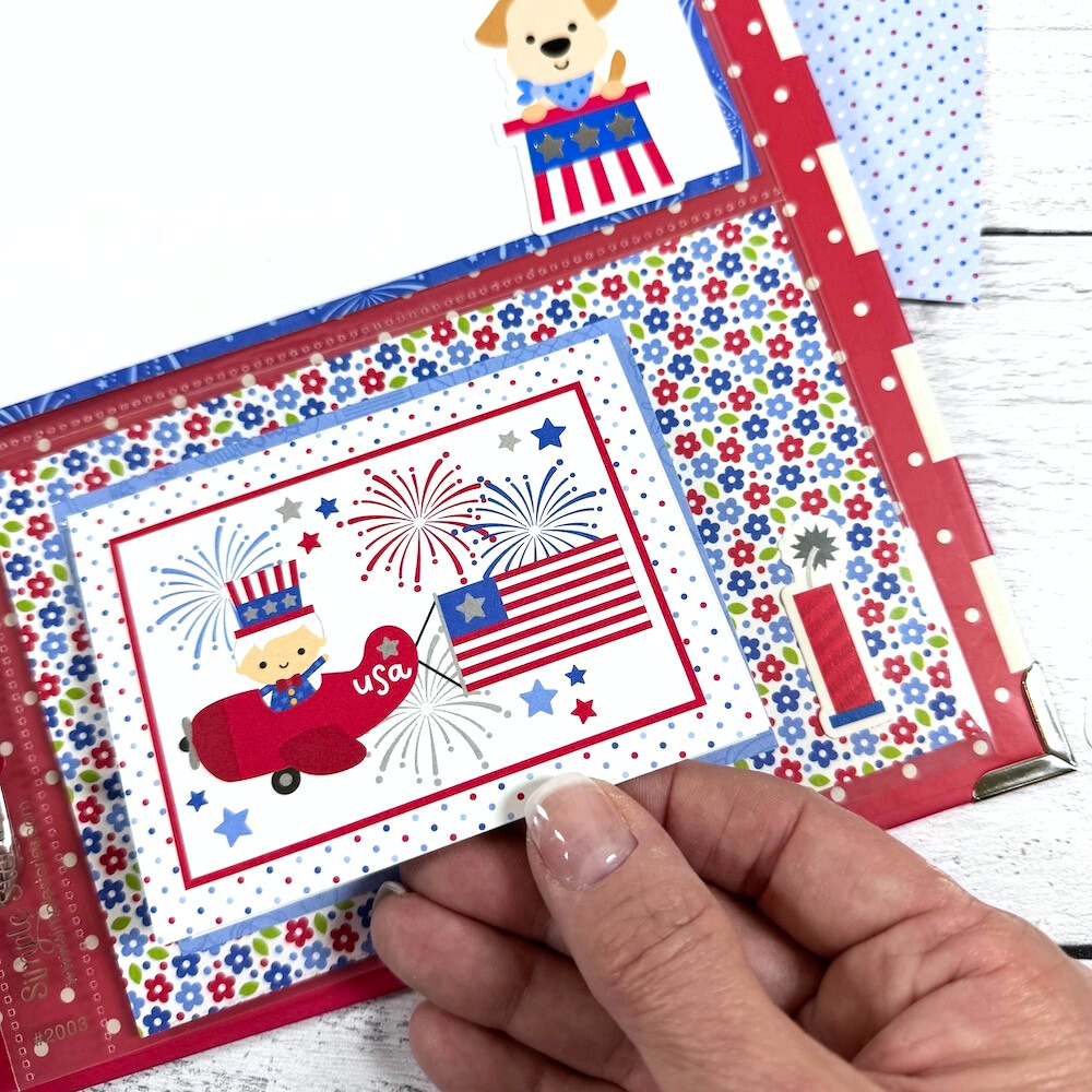 Happy July 4th Scrapbook Album page with fireworks, flowers, a cute airplane, and a flag banner