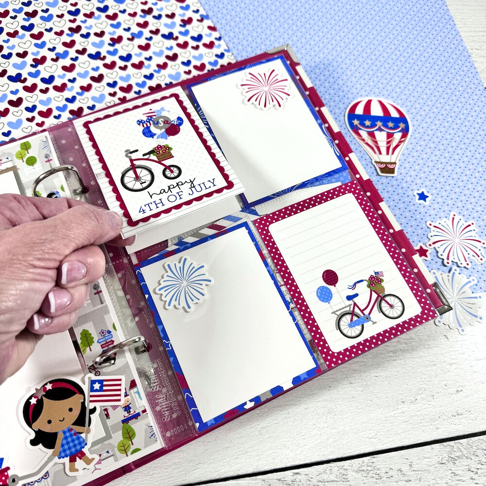 Happy July 4th Scrapbook Album page with bicycles, fireworks, and a folding card