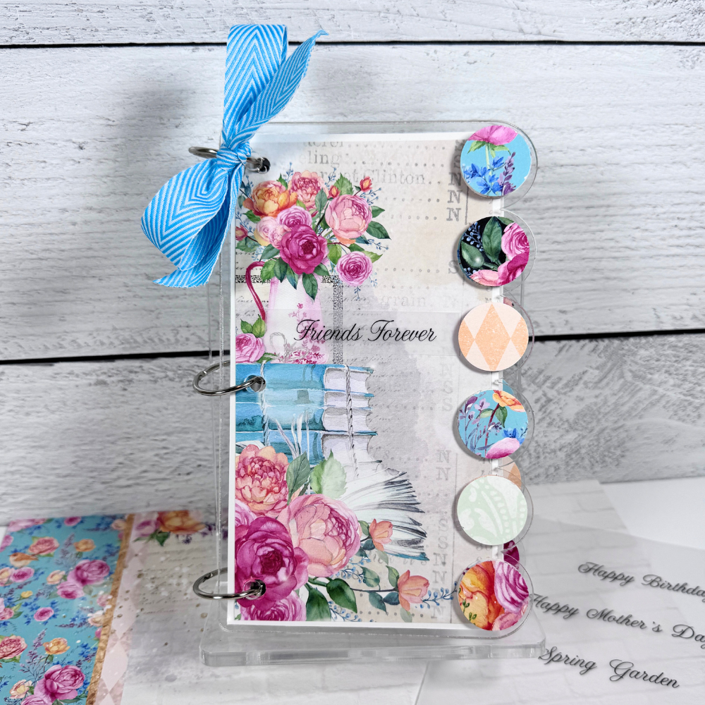 Forever Friends Acrylic Scrapbook Mini Album with a scallop edge, flowers, books, and butterflies and a fabulous clear acrylic display stand