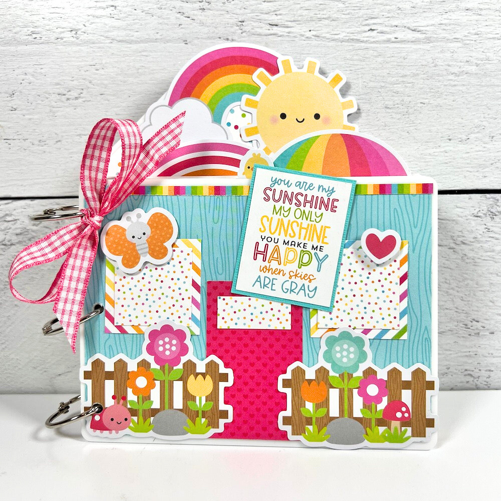 You Make Me Happy Spring Scrapbook Album with rainbows, butterflies, ladybugs, sunshine, and flowers