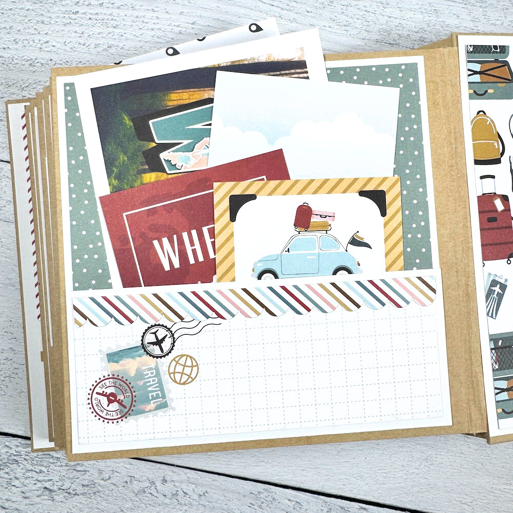 Travel The World With Me Scrapbook Album page with a pocket, journaling cards, and travel stamps