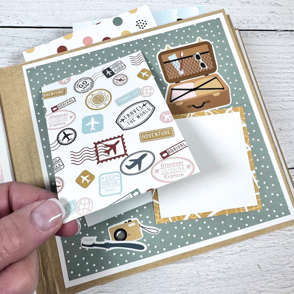 Travel Scrapbook Album page with airplanes, polka dots, a suitcase, and travel stamps