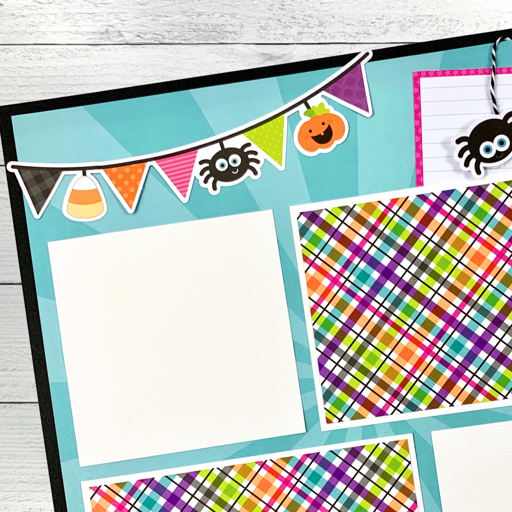 12x12 Halloween Memories Scrapbook Page Layout with a cute flag banner, spiders, a pumpkin, candy corn, and colorful plaid photo mats