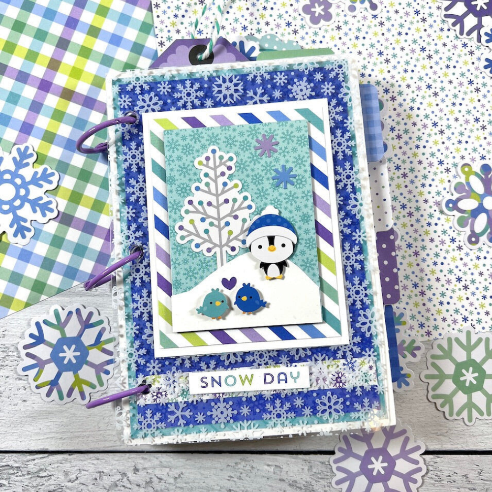 Snow Day Winter Scrapbook Mini Album with snowflakes, cute animals, an acetate cover, tags, and twine