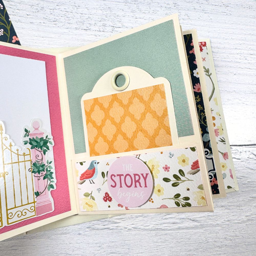 Always Forever Scrapbook Mini Album Page with a pocket, a tag with a grommet,  flowers, and birds