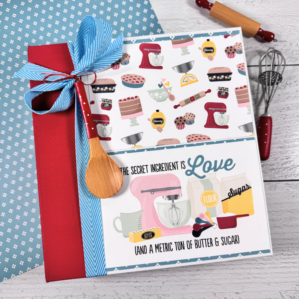 Recipe Scrapbook Mini Album with a ribbon, a wooden spoon, bright colors, food, appliances, flowers, and fun kitchen items