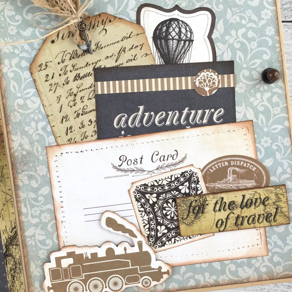 Vintage Style Travel Scrapbook Album with postcards, a pocket, tags, journaling cards, handwriting, a map, a train, and a hot air balloon
