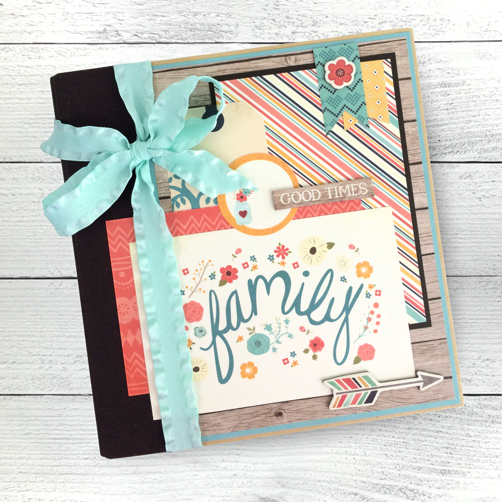 Family Good Times Scrapbook Album with pretty flowers, pattern papers, and a blue bow