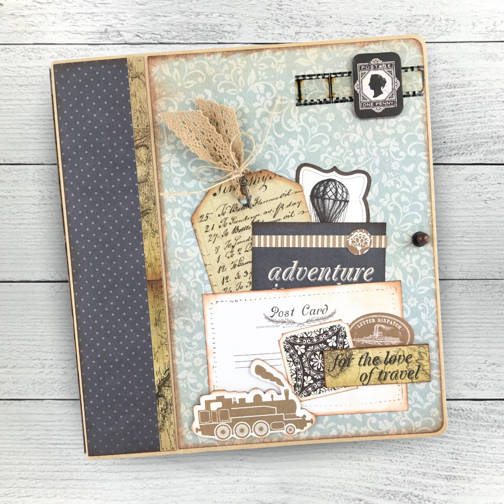 Vintage Style Travel Scrapbook Album with postcards, a pocket, tags, journaling cards, handwriting, a map, floral patterns, a train, and a hot air balloon