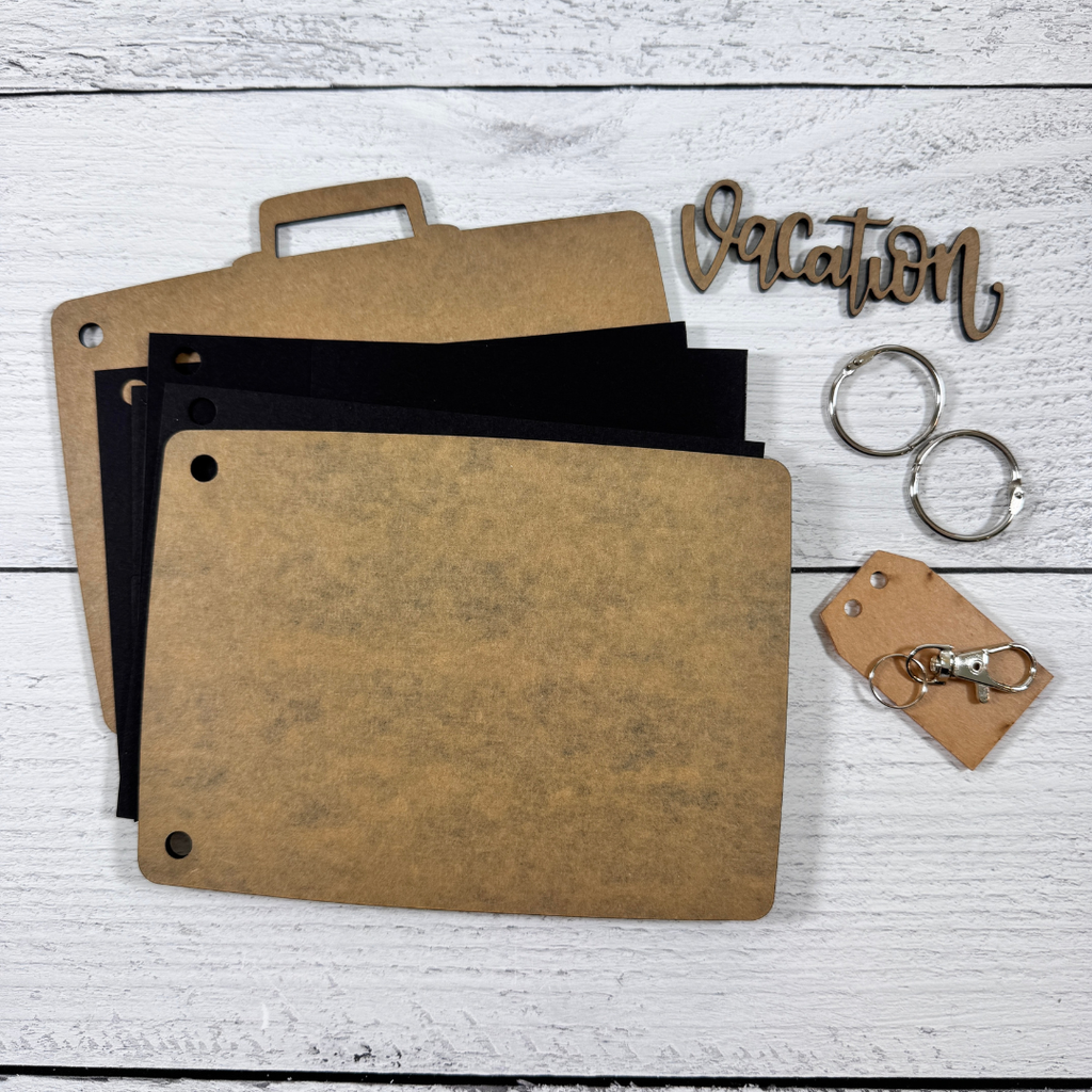 Acrylic Suitcase Shaped Scrapbook Album with a vacation title, clear luggage tag charm, binding rings, and card stock pages