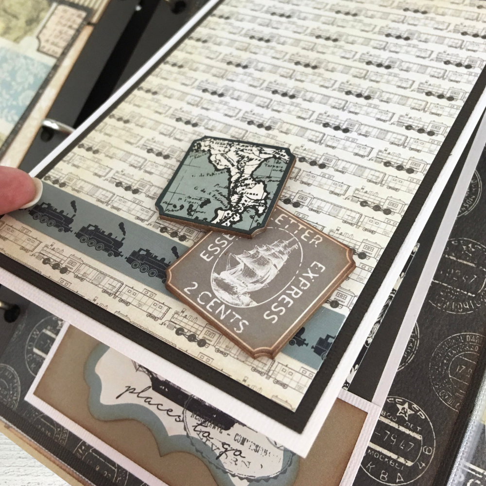 Vintage Travel Scrapbook Album page with a folding card, maps, travel stamps, and trains