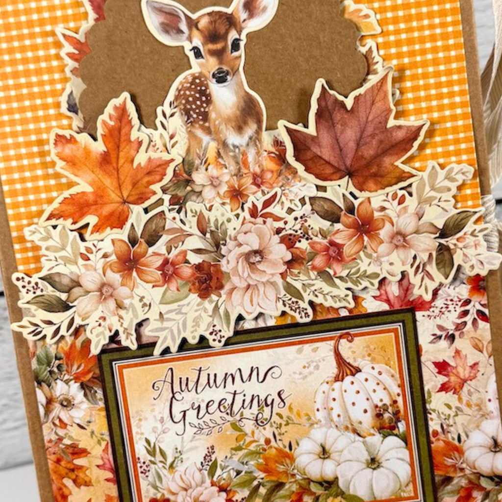 Autumn Greetings Scrapbook Album Kit with pretty fall leaves, flowers, pumpkins, and a baby deer