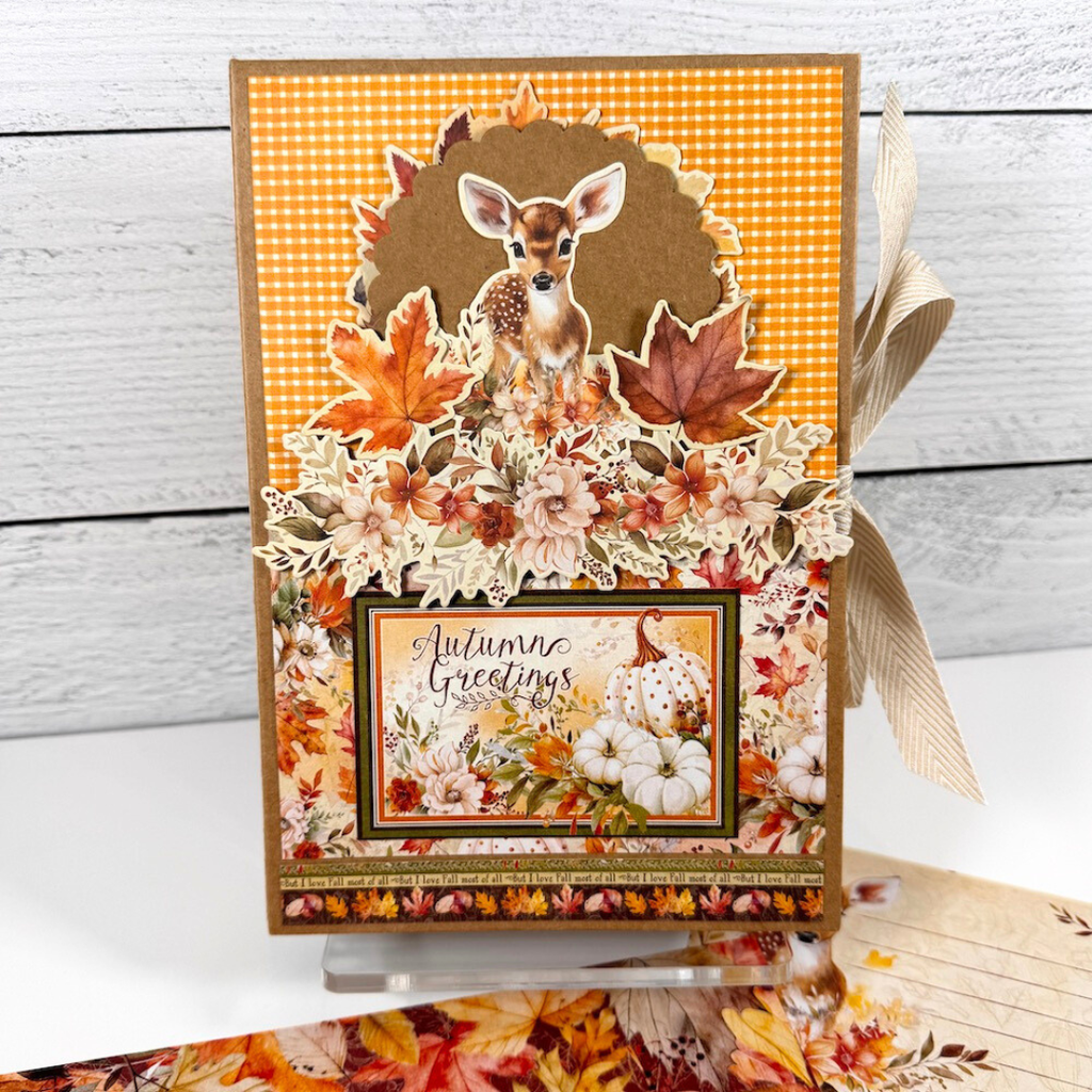 Autumn Greetings Scrapbook Album Kit with pretty fall leaves, flowers, pumpkins, and a baby deer