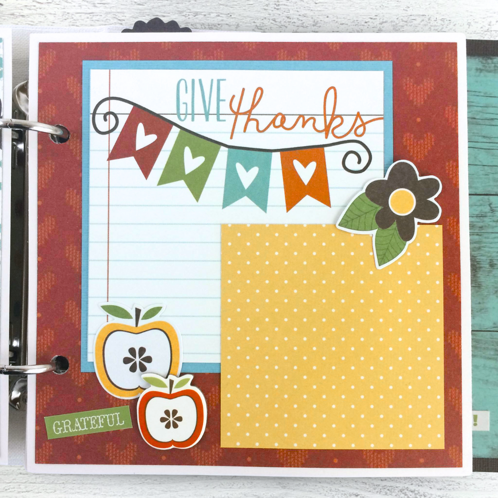Fall Memories Scrapbook Album Page with a banner, apples, journaling card, flowers, and hearts