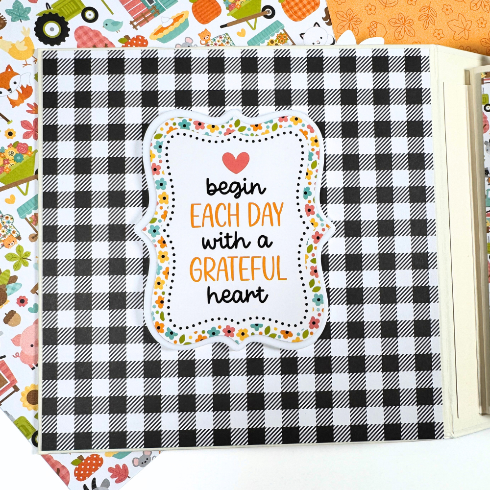 Happy Thanksgiving Scrapbook Album Page with a shaped acrylic shaped piece, flowers, a saying, and a checkered paper