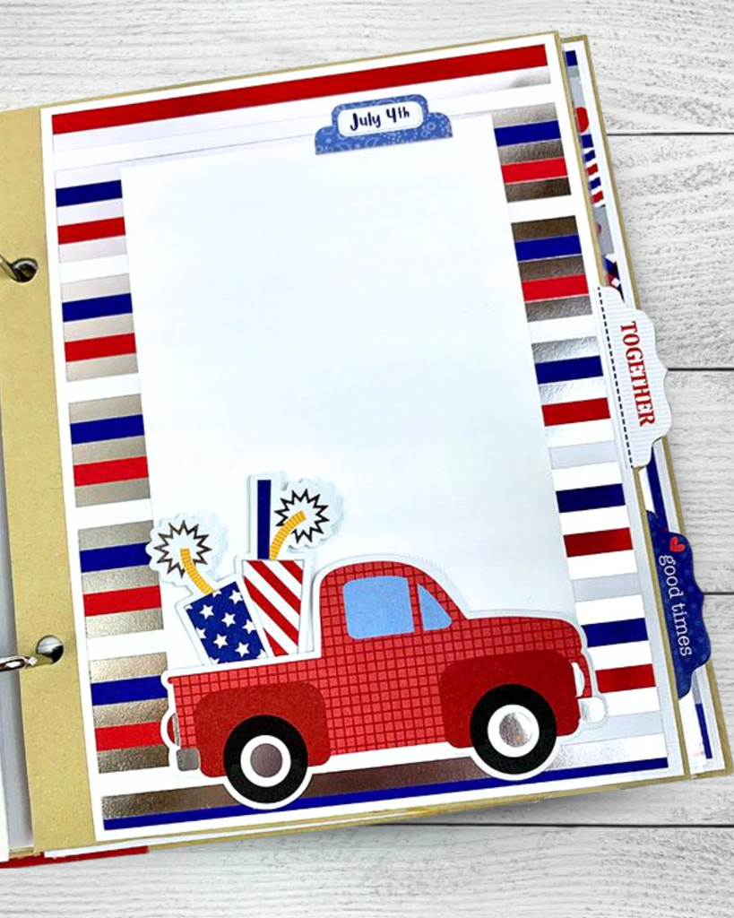 July 4th Scrapbook Album Page with metallic stripes, a red truck, fireworks, and a photo mat