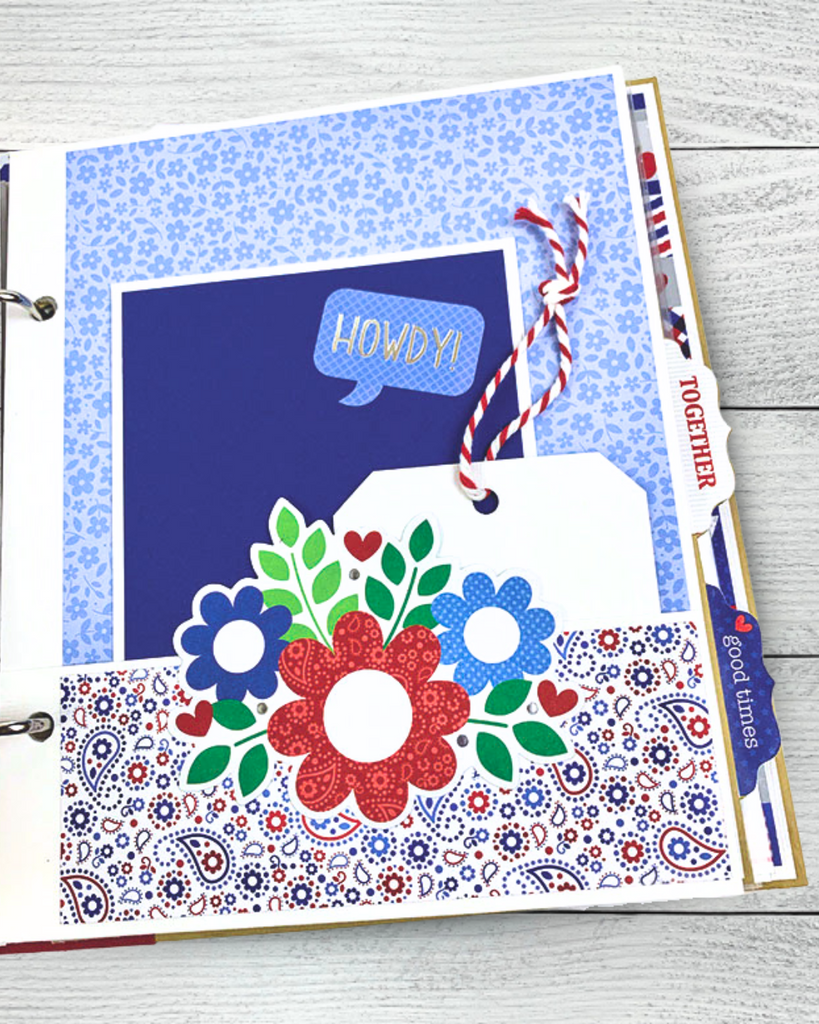 July 4th Scrapbook Album Page with flowers, a paisley print, and a pocket with a tag and twine