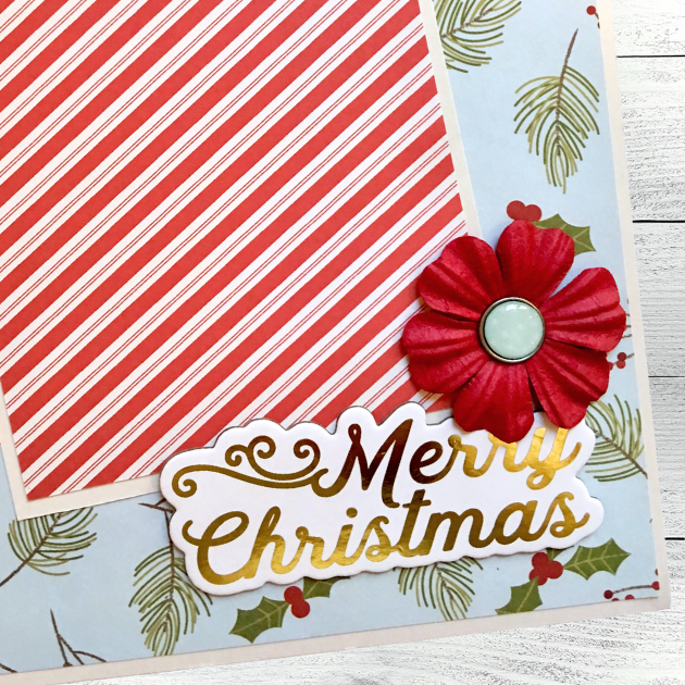 Magic of Christmas Scrapbook Album Page with a red flower, pine branches,  gold foil words, and red and white stripes 