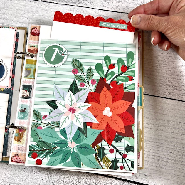 Christmas Scrapbook Page with poinsettias and a pocket for Daily December holiday photos