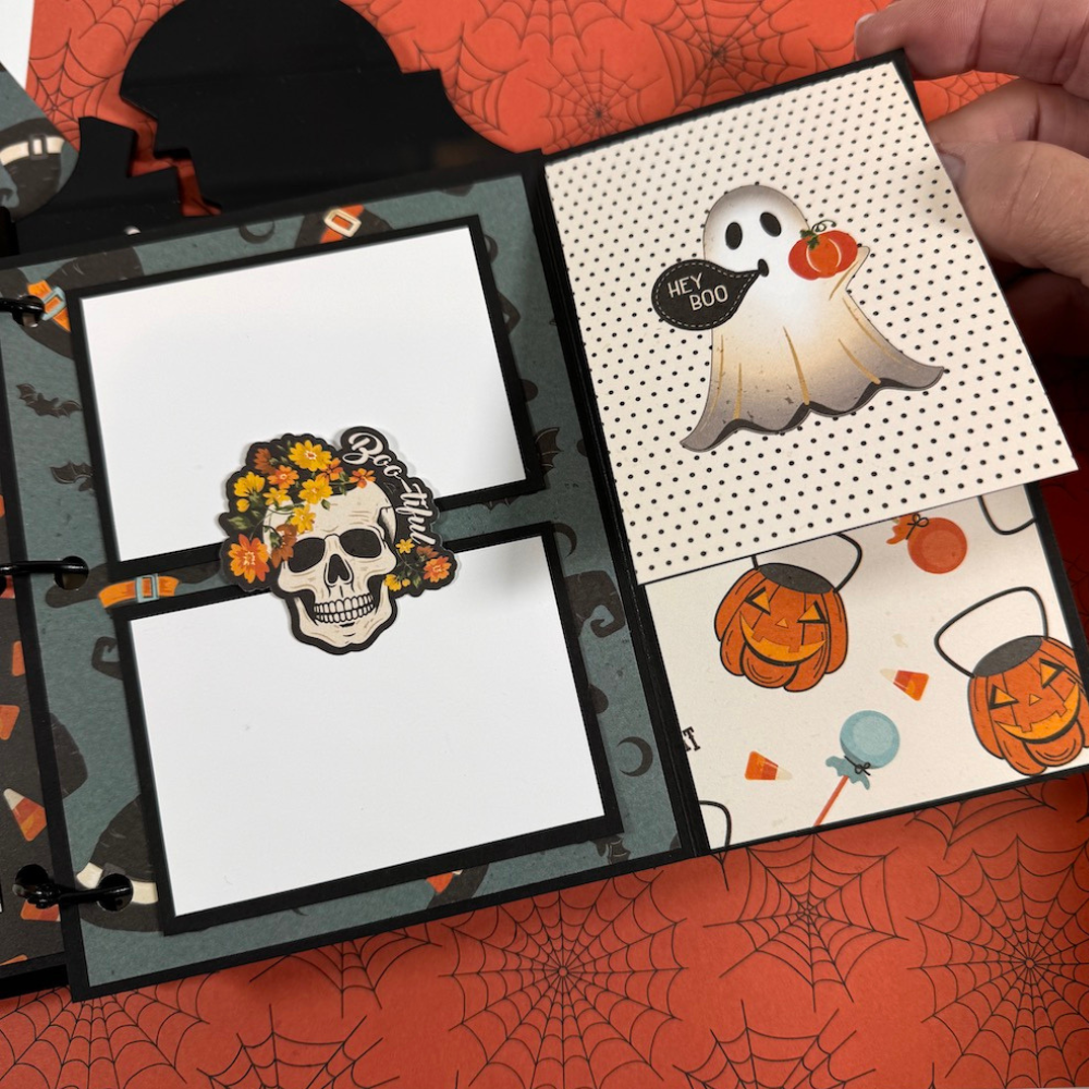 Halloween Tombstone Shaped Scrapbook Album Page with a skeleton, ghost, bats, and candy