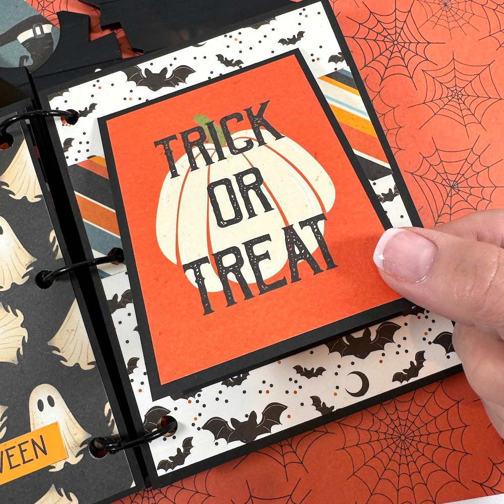 Halloween Tombstone Shaped Scrapbook Album Page with a folding card, a pumpkin, ghost, and bats