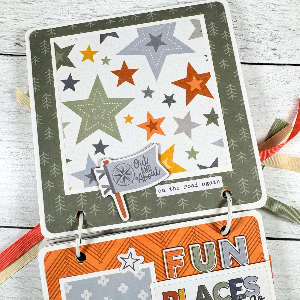 Adventure Scrapbook Mini Album Page with trees, colorful stars, and a flag