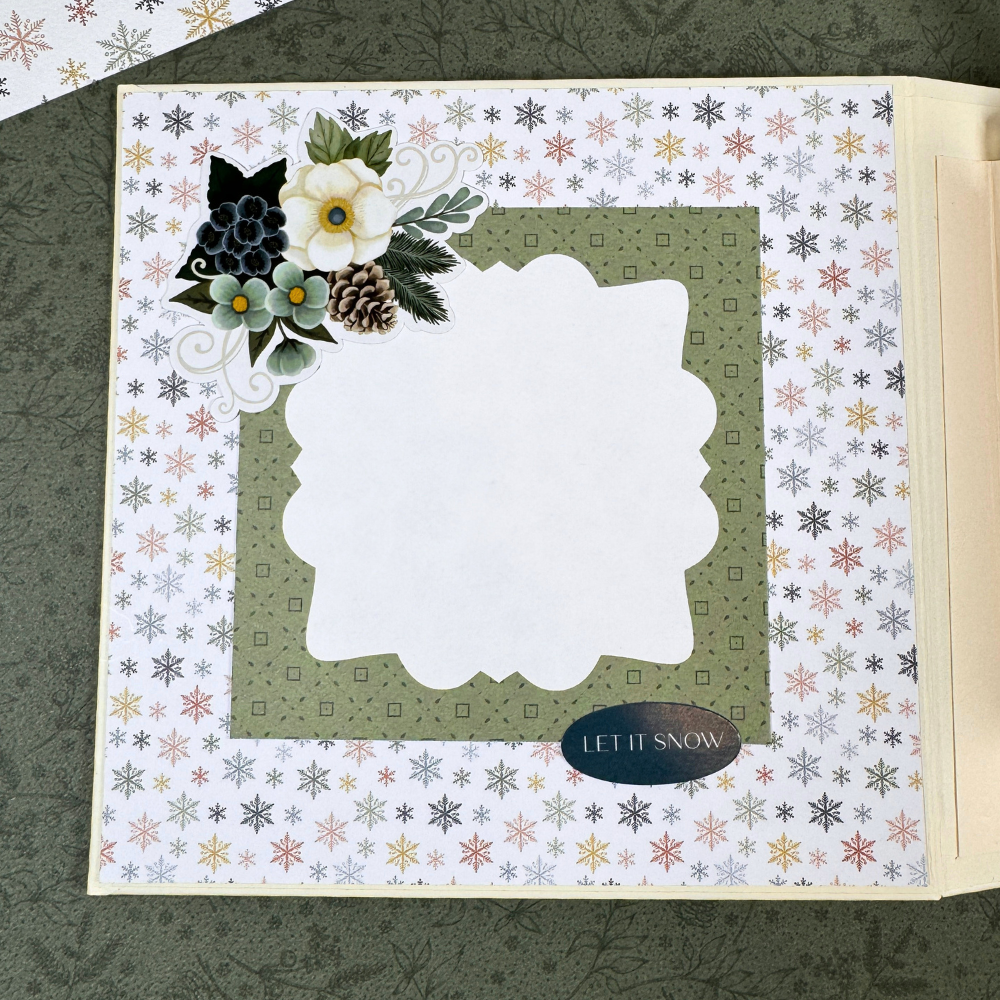 Let It Snow Scrapbook Album page with snowflakes, flowers, and pine cones