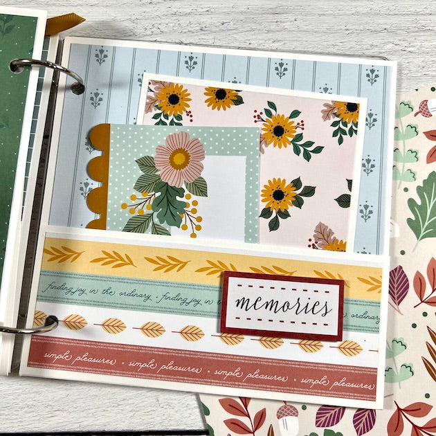 These Are The Days Fall Scrapbook Album Page with with a pocket, flowers, and pretty autumn leaves