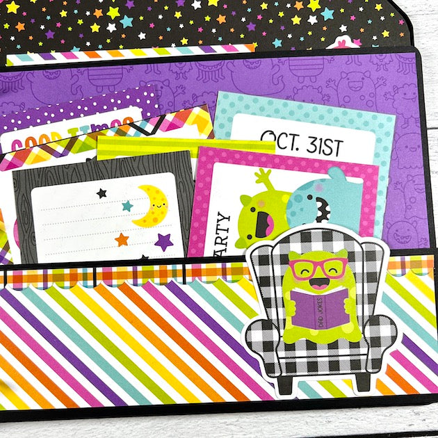Monster Madness Halloween Scrapbook page with colorful pocket