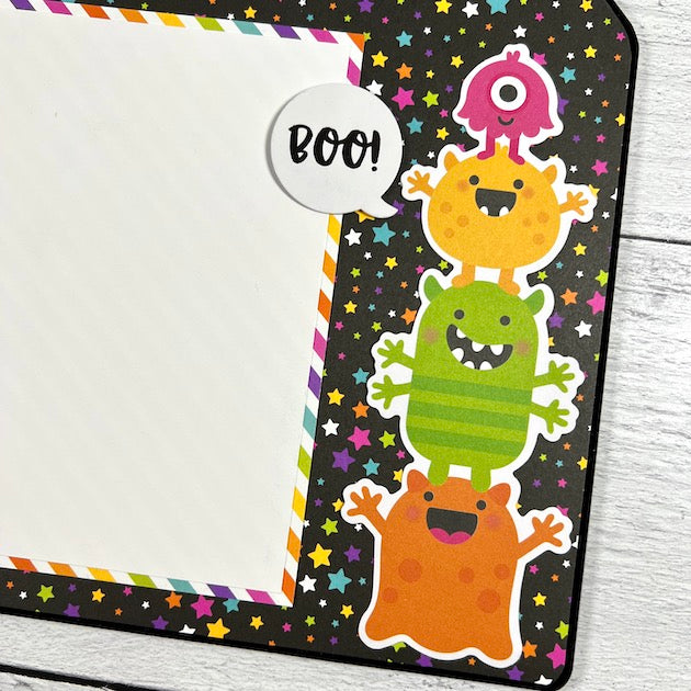 Halloween Scrapbook Page with cute monsters and stars