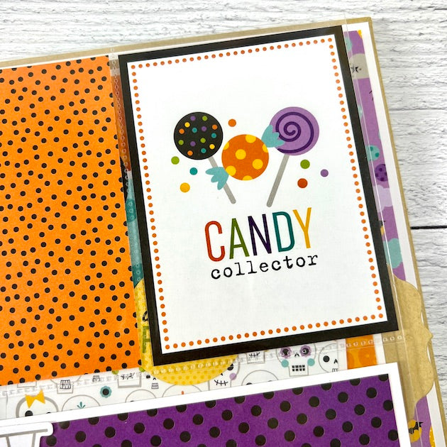 Halloween scrapbook album page for photos of trick or treating and candy