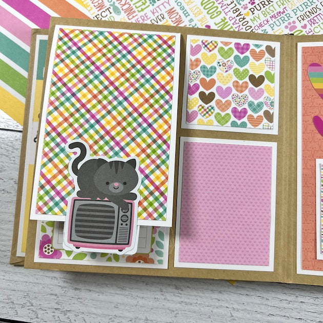 Kitty Cat Scrapbook Album page with a cat on a tv, hearts, and a rainbow plaid