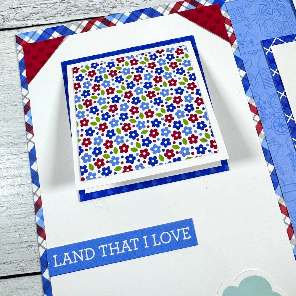 July 4th 12x12 Scrapbook Page Layout flowers, a plaid paper, and a folding card