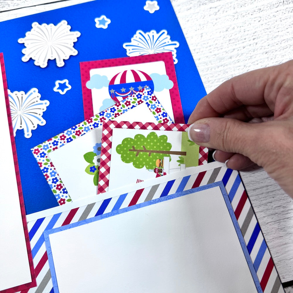 July 4th 12x12 Scrapbook Page Layout with fireworks, a pocket, and cute journaling cards