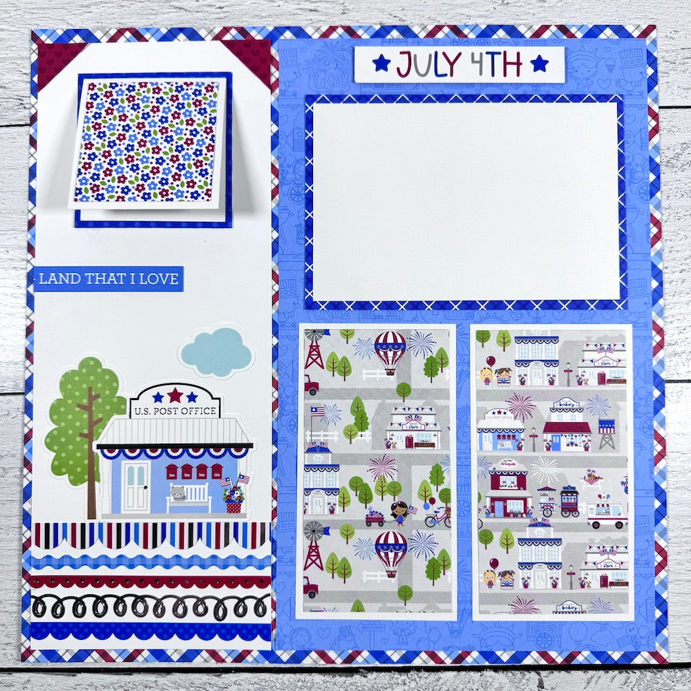 July 4th 12x12 Scrapbook Page Layout with a pretty plaid, flowers, Main Street, and fun border stickers