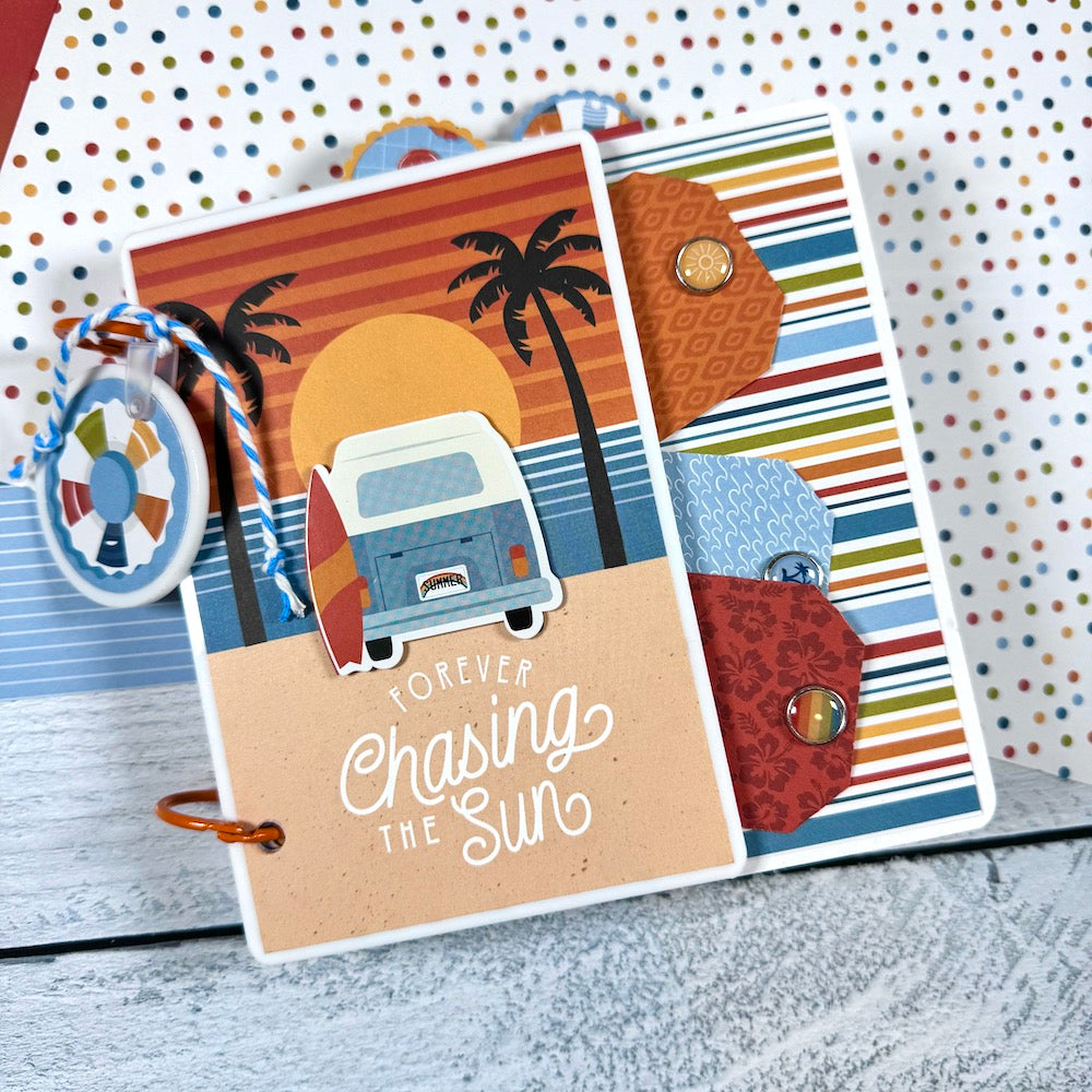 Chasing the Sun Summer Scrapbook Album with a sunset, a VW bus, and cute tags