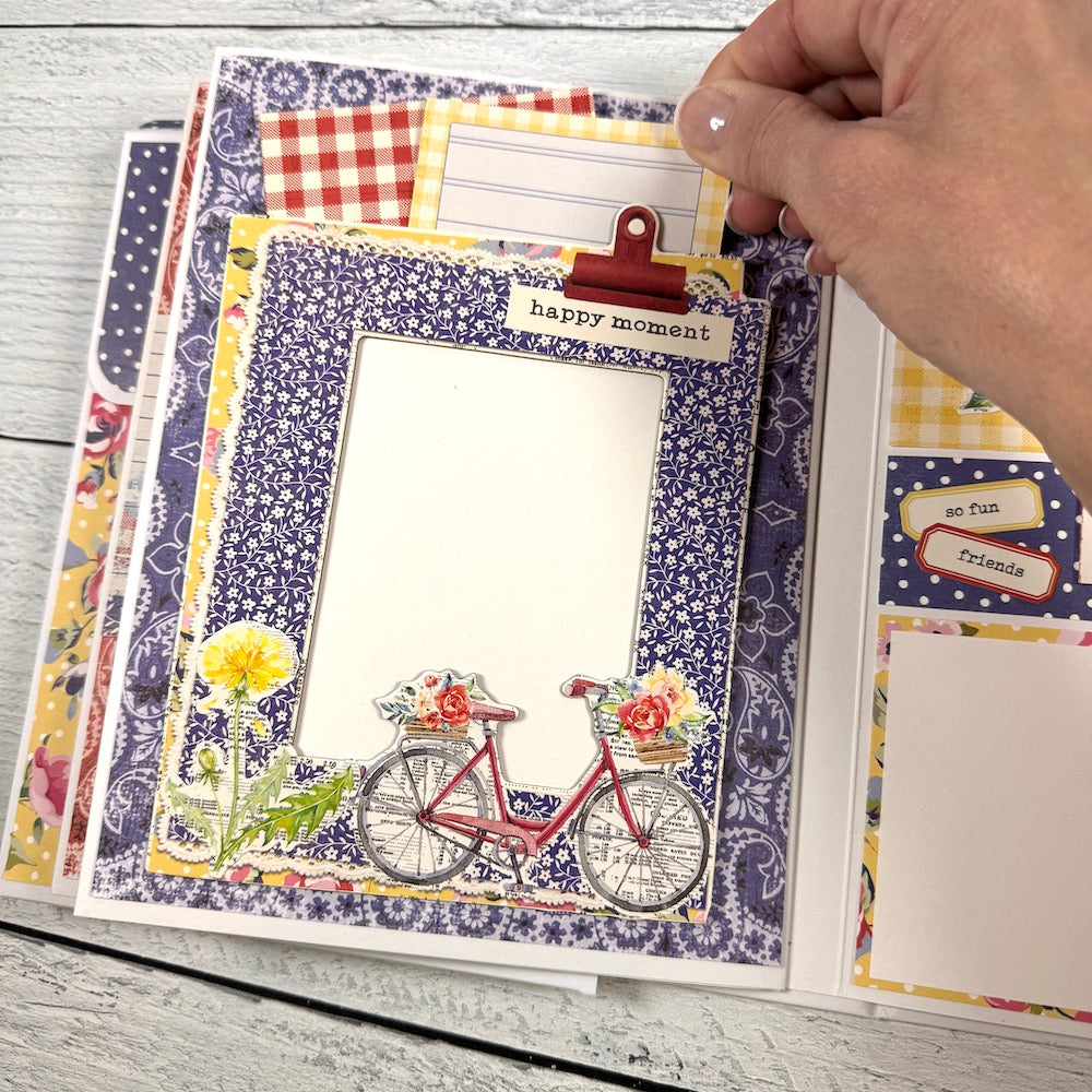 Easy Breezy Summer Scrapbook Album Page with a pocket, journaling cards, a dandelion, flowers, and a bicycle